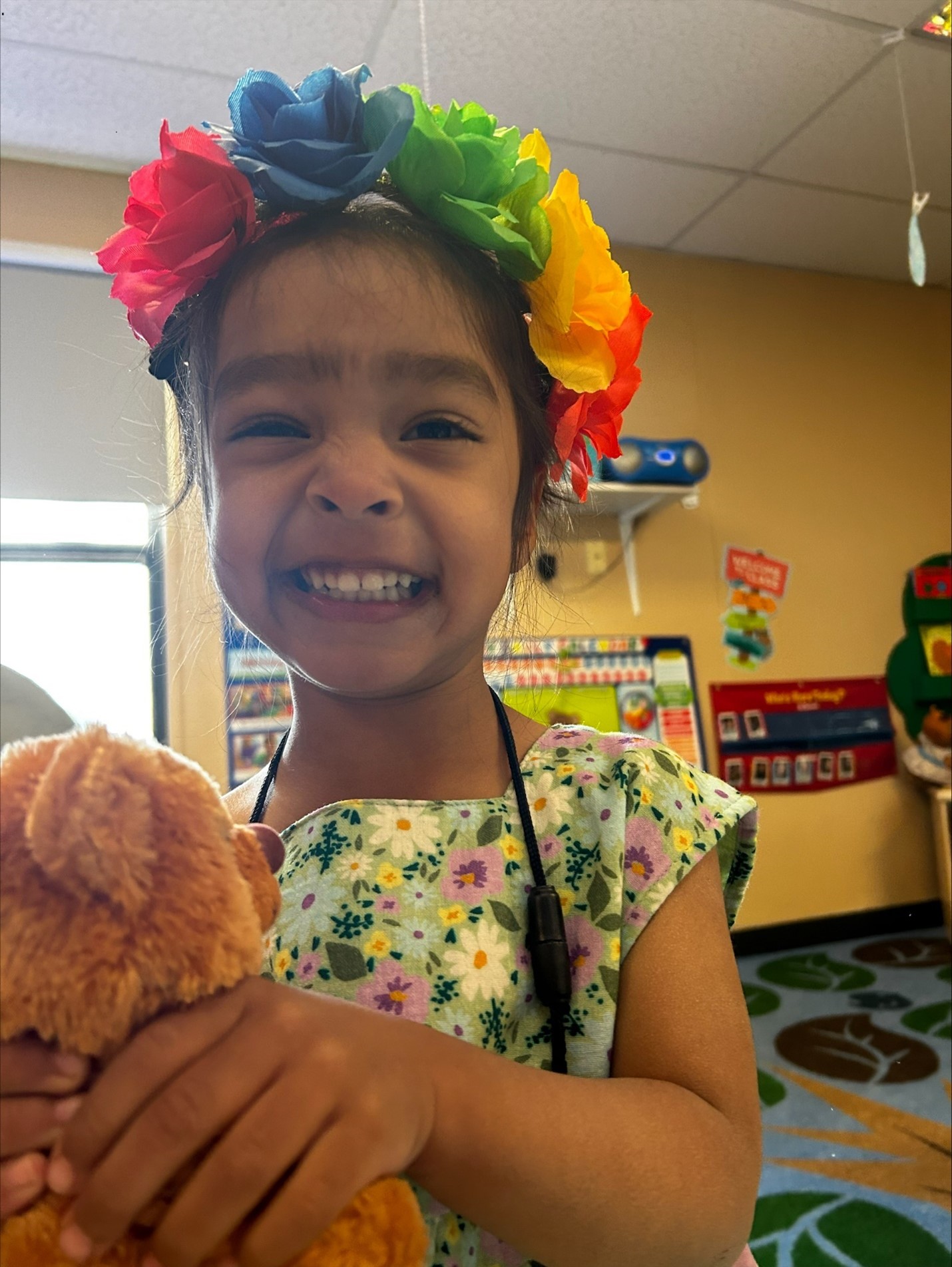 Girl wearing flower crown on her head, dressed like Frida Kahlo